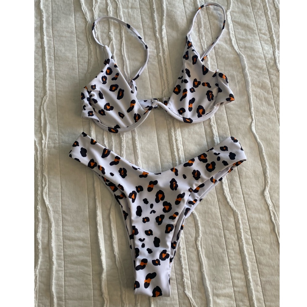 White leopard bikini, like new. Never worn.